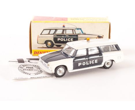A French Dinky 1429 Break Peugeot 404 Police Car, dark blue/white body, plated concave hubs, in original box with aerial in b
