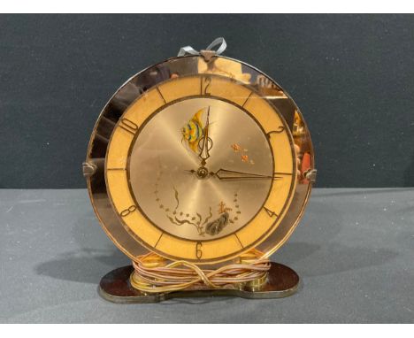 An Art Deco Smiths Peach glass Aquarium mantel clock, 20.6cm diameter, Bakelite plinth
