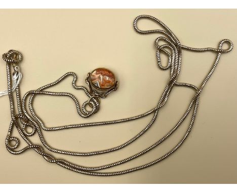 A 9ct gold swivel agate watch fob pendant with tested 9ct gold chain, the swivel watch fob pendant has oval cabochon moss aga