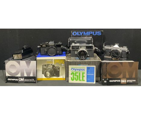 Cameras - an Olympus OM-2 35mm camera, serial number 675470, instructions, promotional pamphlet, boxed; an Olympus electronic
