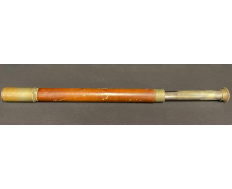 A late 19th/early 20th century brass telescope, brown leather grip, 45cm closed