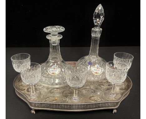 A Thomas Webb cut glass ships decanter with a Coalport porcelain "Sherry" label; a THomas Webb decanter with a Coalport "Whis
