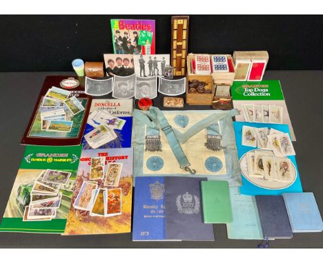 Players gold leaf and other playing cards, cribbage board, Junghans traveling Alarm, Masonic Regalia inc Apron, books; cigare