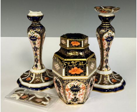 A Royal Crown Derby 1128 Imari pattern candlestick, 16cm high, date code for 1928; another, faults; a 1128 pattern hexagonal 