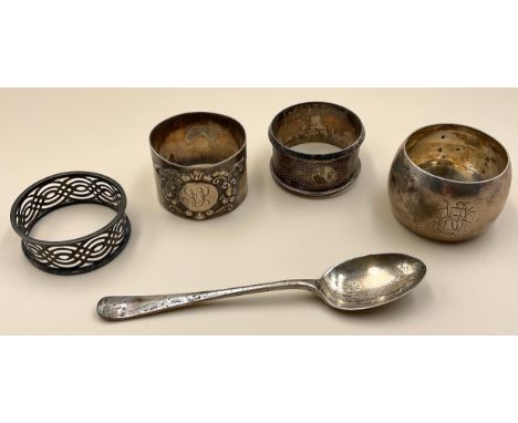 A Victorian silver napkin ring, central oval cartouche engraved with initials, scrolling foliate border, London 1896; others 