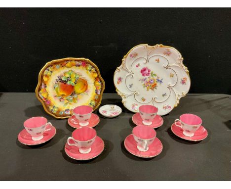 A German Kennerberg porcelain shaped circular cabinet plate, printed with summer flowers, picked out in gilt; a set of six Ro