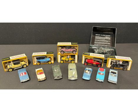 A Corgi Classics model car, number 9031, others similar 9032, 9013, 9012, 9002, and a Model T No.901, all boxed; a Corgi Lotu