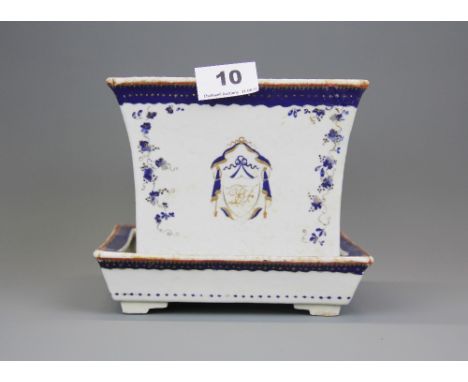 A Chinese export armorial porcelain planter and dish (A/F), H. 15.5cm. W. 18cm.