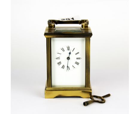 A French brass carriage clock, H. 15cm. Appears to be in working order.