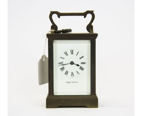 A Mappin &amp; Webb brass carriage clock, H. 15cm.  Understood to be in working order.