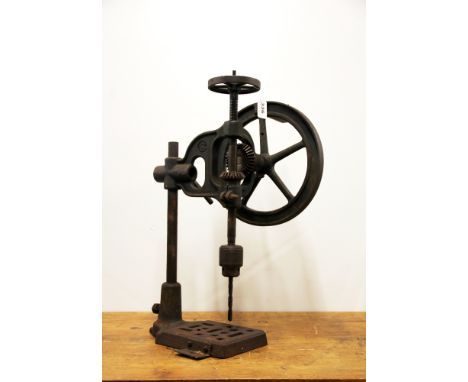 An antique bench drill, H. 59cm.