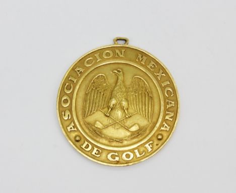 A Mexican yellow metal golf trophy (tested 14ct gold), weight approx 24gr.