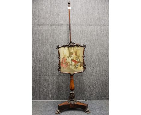 A William IV carved rosewood pole screen with original fine tapestry shield, H.  145cm.