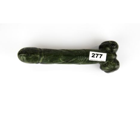 A Chinese carved jade / hardstone phallus, L. 23cm.