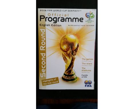 FOOTBALL, programmes from 2006 World Cup, Tournament brochure & 2nd round programme (both English language); rare German gold