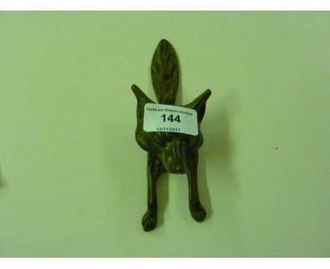A Victorian brass door knocker in the form of foxes head 
