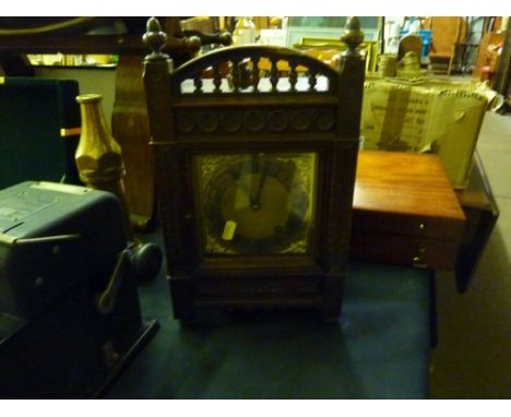 An early 20th century oak cased two hole mantel clock  AF 
