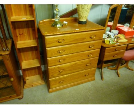 A Homestead light oak five drawer chest 