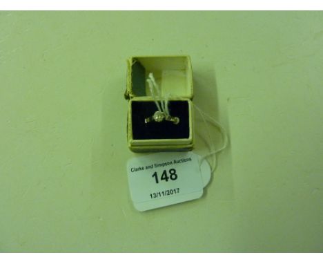 An 18ct gold diamond set ring 