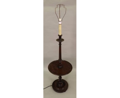 A mahogany turned column combined standard lamp and wine table and a mahogany footstool, on cabriole legs (2).