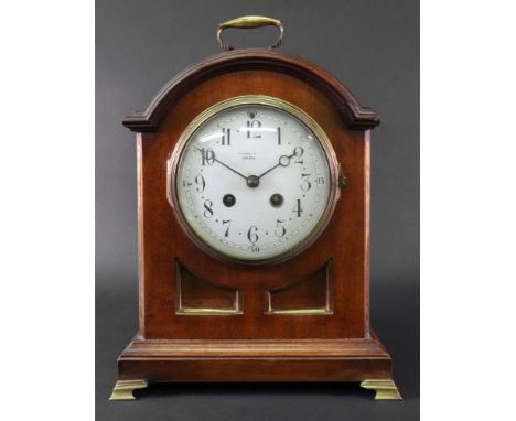 Japy Freres; a George III style mahogany brass mounted bracket clock, circa 1890, the moulded arched top with a carrying hand