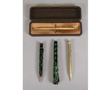 A Vintage green marble effect The 'B-B' fountain pen and propelling pencil, Parker gilt metal ballpoint pen, cased and a roll