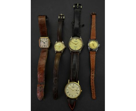 Timex; a stainless steel wristwatch with v-conic escapement, the dial with Arabic numerals, 25mm diameter, together with two 