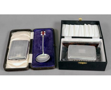 A lady's engine turned silver rectangular cigarette case, Birmingham 1919, the gilt lined interior fitted with a mirror and c