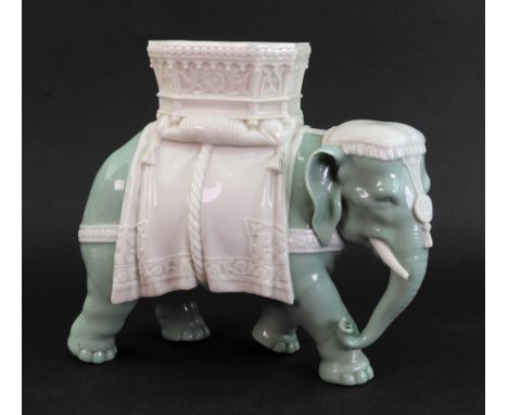 A James Hadley Royal Worcester vase, in the form of an elephant with howdah,  23cm wide x 20cm high.