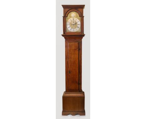 Jos Dudds London; a George III oak longcase clock, the arched moulded hood with rounded pilasters, having a long moulded trun