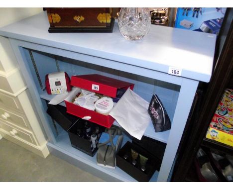 A blue painted bookshelf (only one shelf) Width 92cm, depth 33.5cm, height 97cm