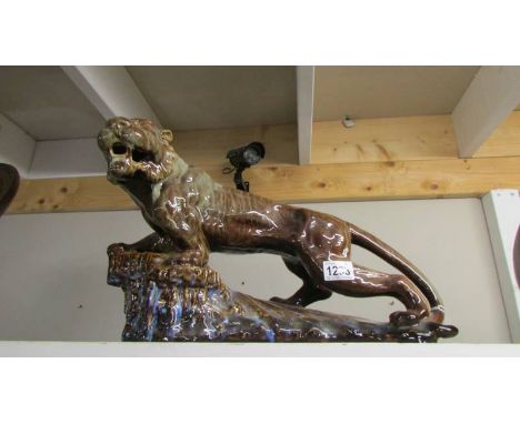 A ceramic figure of a tiger.