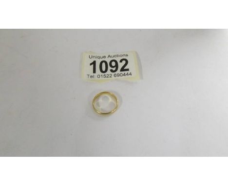 A 22ct gold wedding ring, size G half. 1.4 grams.