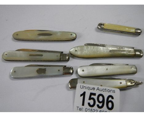 A collection of 5 silver and mother of pearl fruit/penknives and two others.