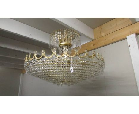 A large glass and gilt chandelier.&nbsp; COLLECT ONLY.