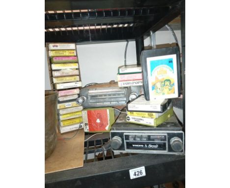 A large 1950's push button (maybe Ford) radio &amp; an original Volvo 8 stereo 8 track/radio with a lot of tapes, COLLECT ONL