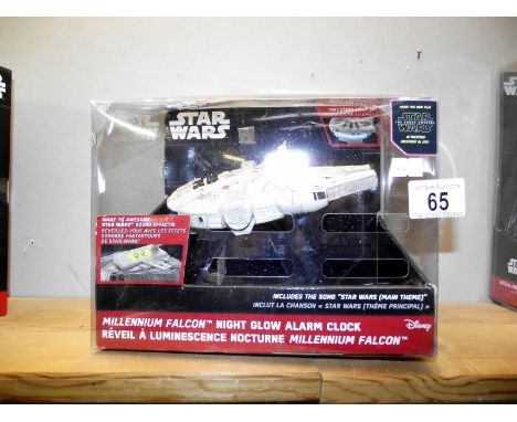 A sealed boxed Star Wars Millenium Falcon night glow alarm clock COLLECT ONLY