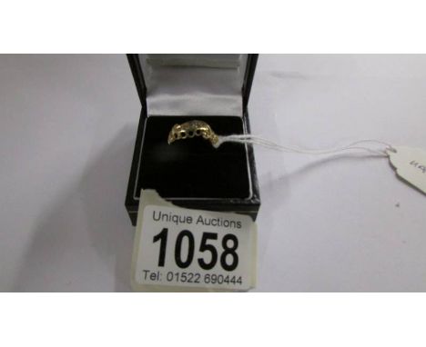 An 18ct gold ring set diamonds, size L. 3.3 grams.