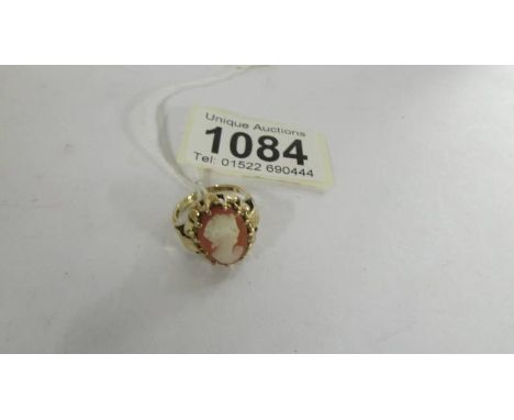 A vintage 9ct gold cameo ring set with a female profile, size J. 3.7 grams.