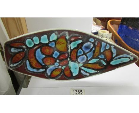 A Poole pottery shield shaped dish.