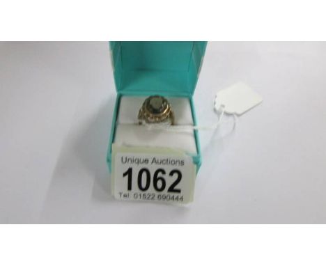 A 9ct gold ring set smoky quartz size L half, 3.7 grams.