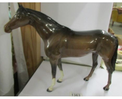 A large ceramic horse, not marked.