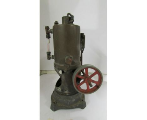 An early 20th-century Bing upright live steam engine.