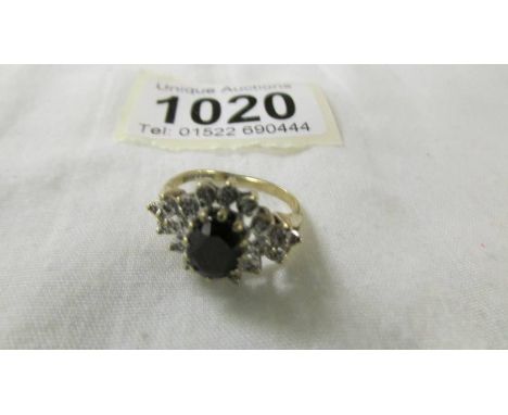 A yellow gold diamond and sapphire ring, size K, 3.2 grams (Hallmark indistinguishable)