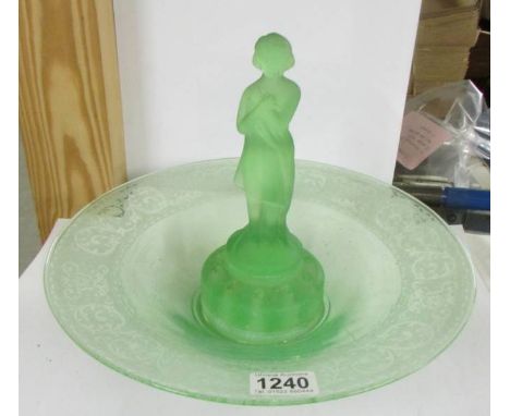 An art deco green glass flower bowl with engraved rim and centre figure.*Condition report*Staining to the inside of the bowl 