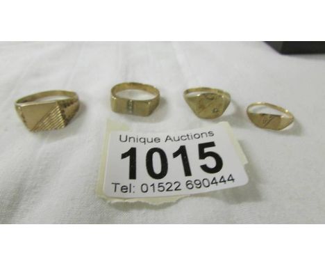 Four 9ct gold rings, sizes J, Q, R and X, 9.6 grams.