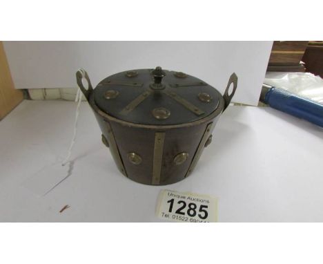 An unusual novelty treen tea caddy in the form of a barrel, circa 1900.