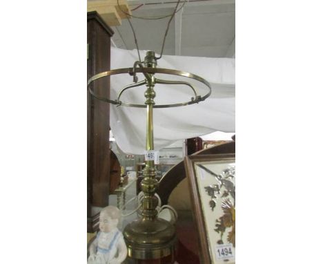 A brass table lamp, no shade. COLLECT ONLY.