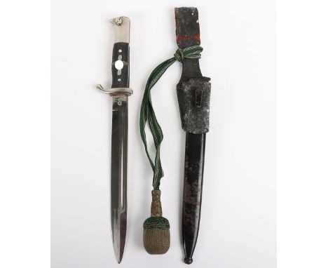 German Armed Forces Parade Bayonet by WKC, with two piece black chequered grips (damaged to the reverse), centre having winge