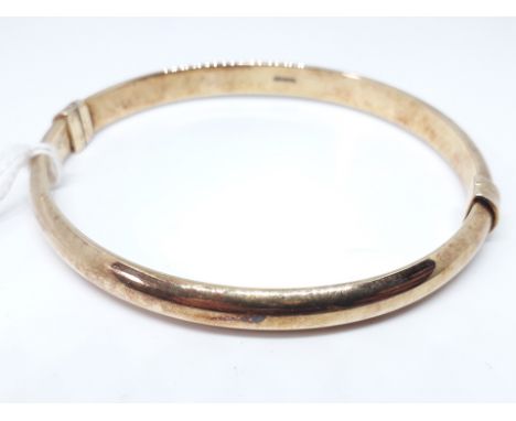 A silver gilt bangle, marked '925', diam. approx. 6.5cm, wt. 14.4g. 